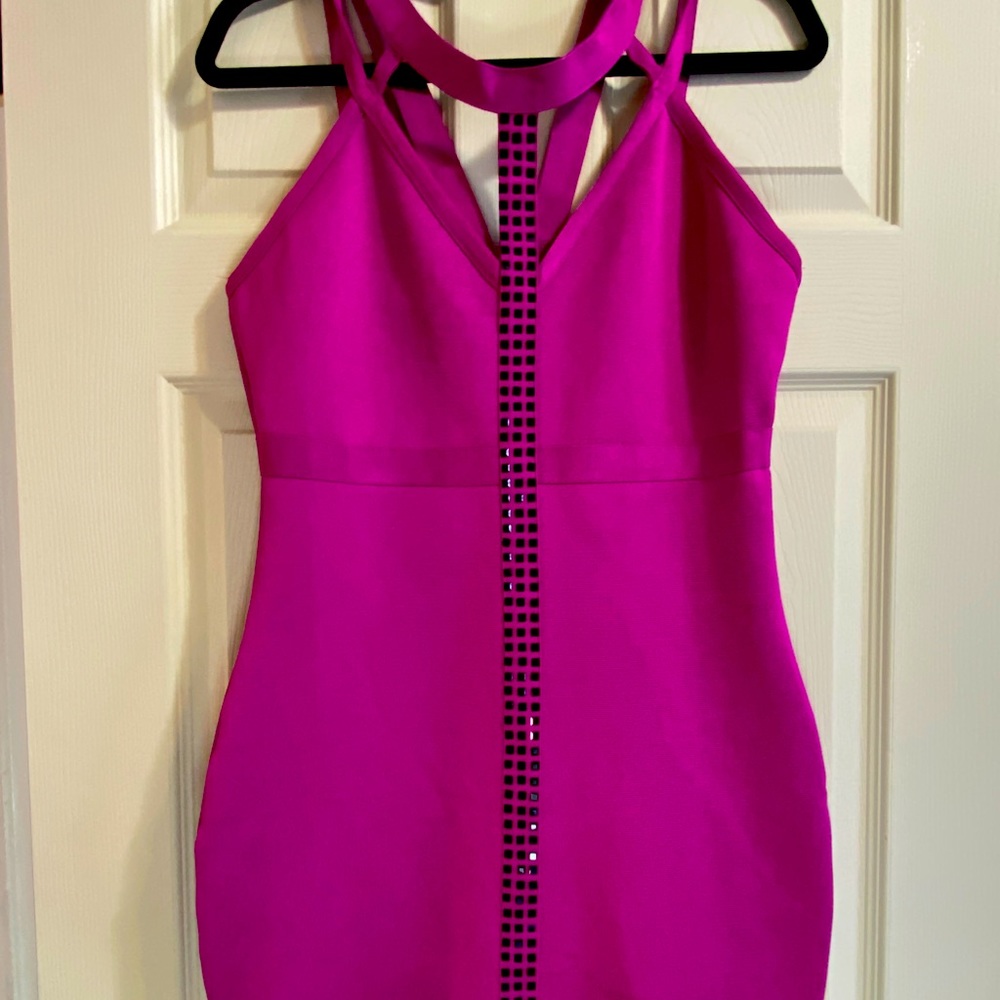 Hot pink strapless bodycon dress.